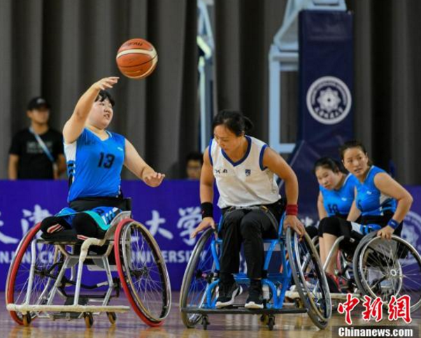 九游app：第十届残运会：汶川女孩轮椅上逐梦篮球(图1)