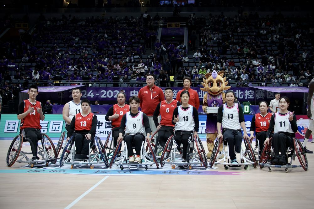 九游官网入口：“轮椅上的篮球梦”公益行动登上CBA季后赛赛场(图2)