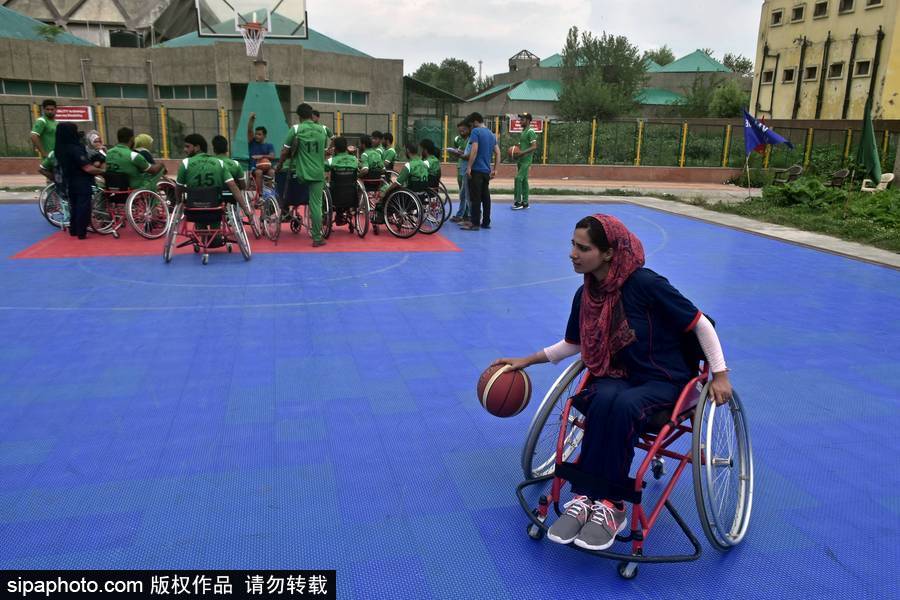 宁夏运动员杨世全勇夺全国肢残人轮椅马拉松赛冠军(图1)